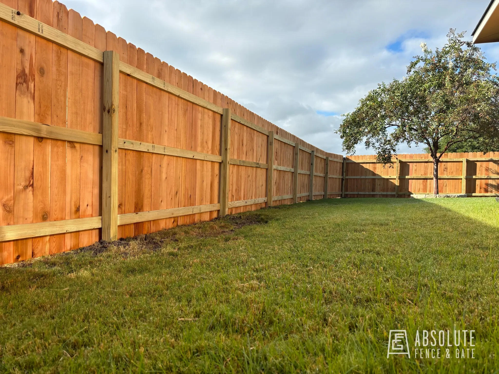 Cedar fence backyard installation in Central Texas